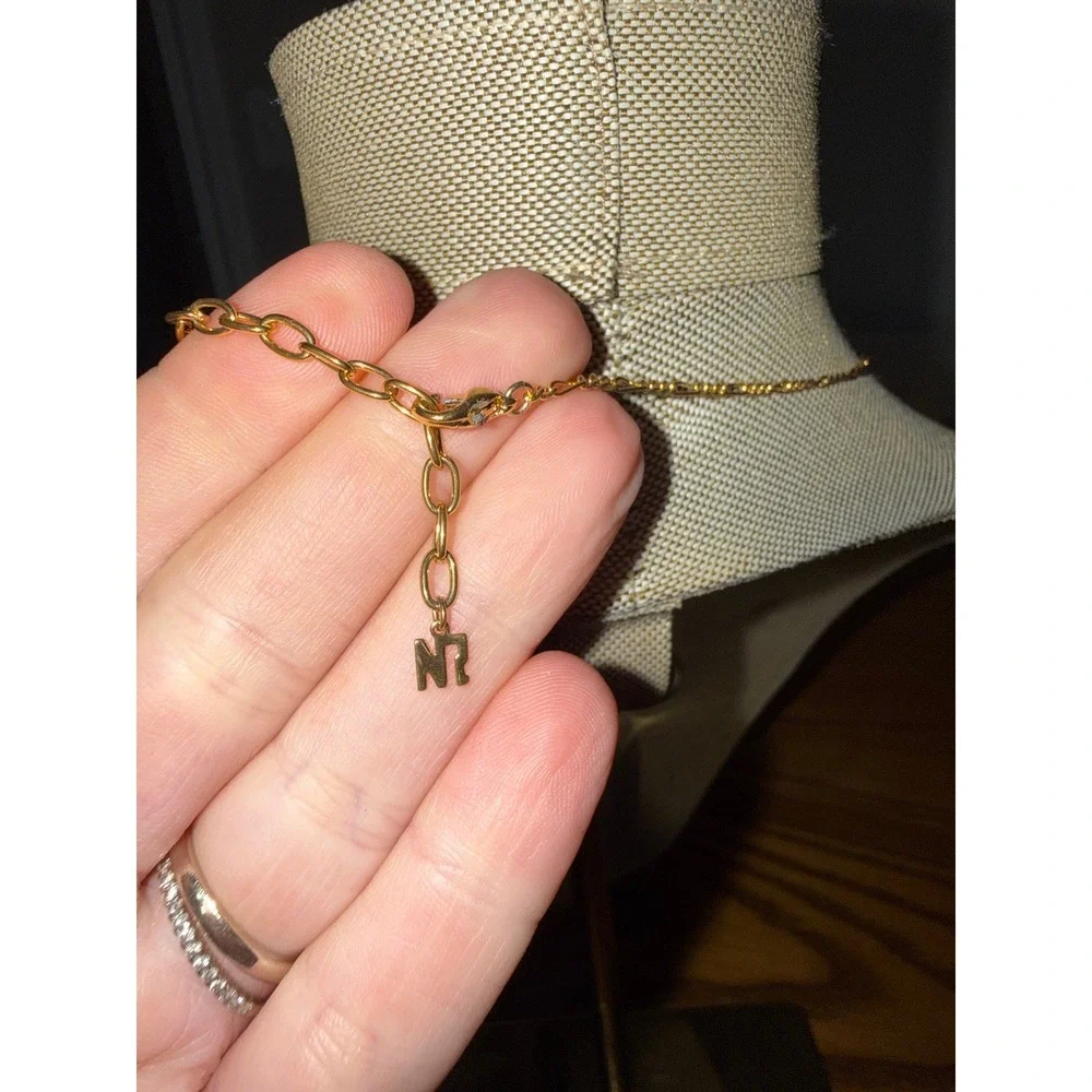 Nina Ricci Gold Tone NR Logo Bow Rhinestone Figaro Chain Necklace Vintage Style